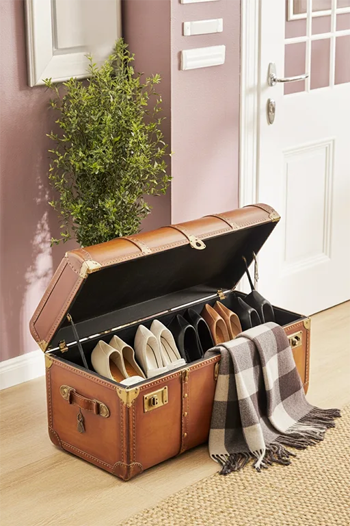 This design highlights entryway shoe storage ideas to make the most of empty spaces