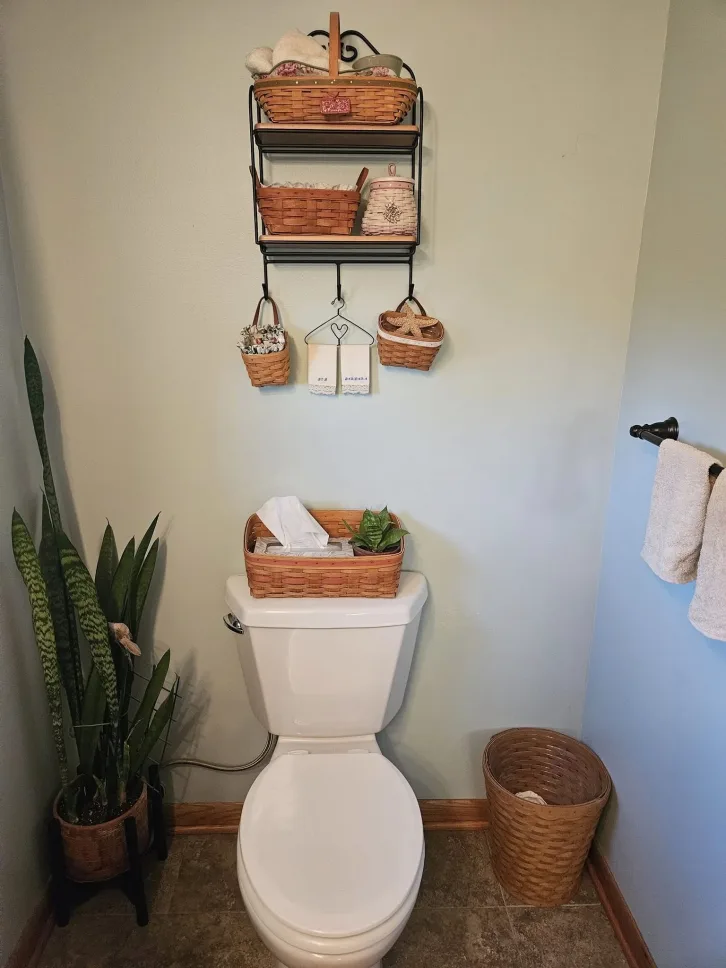 Woven basket on the toilet tank 1